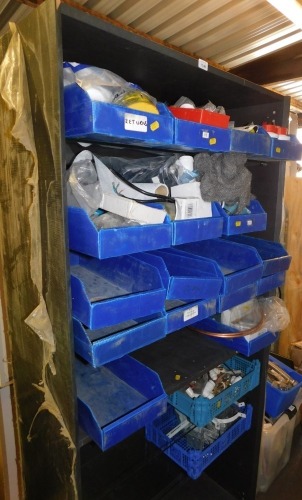 A shelving unit with parts bins, contents, etc. Note: VAT is payable on the hammer price of this lot at 20%.