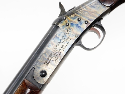 A single barrel 12 bore shotgun by Harrington & Richardson Inc, USA, model 176, patent no. 3988848, serial no. AU543012, barrel 92cm. NB. A current valid Registered Firearms Dealer Certificate will be required to view and bid for this lot. For Sale by T - 3