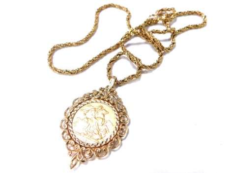 A Victorian full gold sovereign pendant and chain, dated 1890 in 9ct gold scroll pendant frame, 5cm high, on a 9ct gold woven neck chain, 26.2g all in, 54cm long overall.