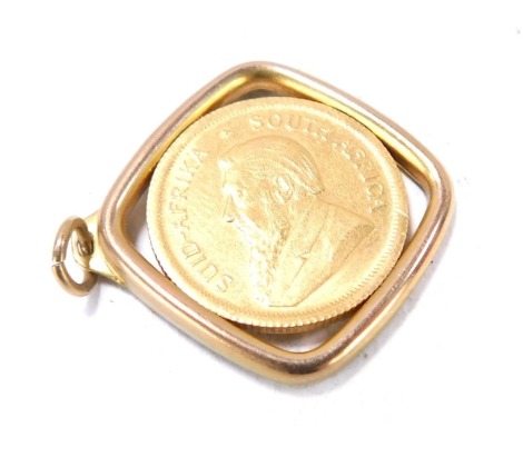 A 1/10th oz Krugerrand pendant, in 9ct box frame, 4.6g all in, 2cm high.