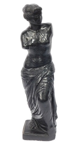 A black painted plaster figure of the Venus de Milo, on a rectangular base, 87cm high.