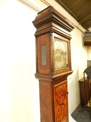 A William & Mary walnut and marquetry longcase clock, with caddy top hood, full length trunk door with bulls-eye glass, with marquetry reserves of birds and flowers, later decorated base, the square brass dial with amorini spandrels, silvered chapter ring - 2