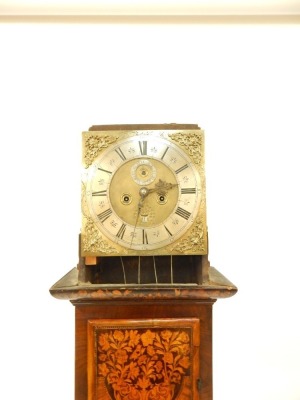 A William & Mary walnut and marquetry longcase clock, with caddy top hood, full length trunk door with bulls-eye glass, with marquetry reserves of birds and flowers, later decorated base, the square brass dial with amorini spandrels, silvered chapter ring - 3