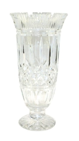 A Waterford crystal vase, of crenulated and footed form, etched mark, 28cm high.