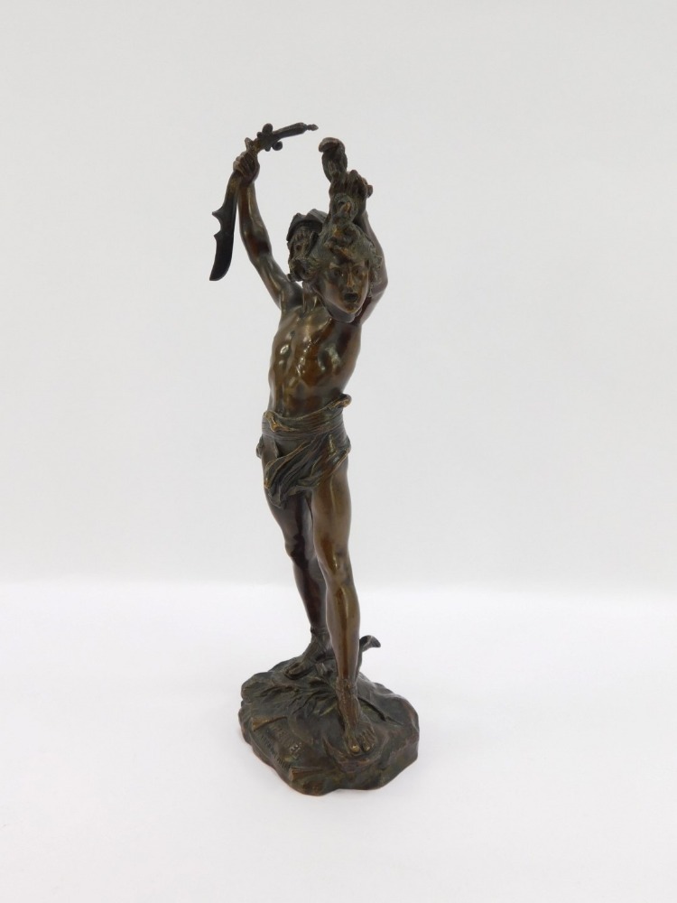 After Jules Edouard Roine. A bronze figure of Perseus holding the head ...