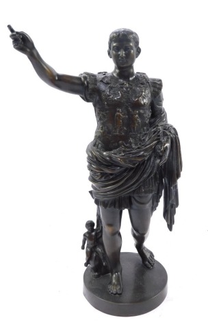 After The Antique. A bronze figure of 'Augustus of Prima Porta' The Emperor Augustus Caesar, dressed as a General, in the act of addressing his troops, in full armour, his right arm outstretched, behind Cupid riding a dolphin, raised on a circular base, 