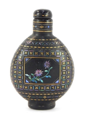 A Japanese Lac Burgaute snuff bottle, possibly 19thC, each side inlaid in mother of pearl with a reserve of flowers against a geometric patterned ground in shell and gold, bears two character senri mark to base, with stopper and spoon, 6.5 high.