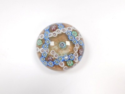 A Clichy millefiori glass paperweight, floral design, against a gold eventurine ground, 8.5cm diameter. - 2