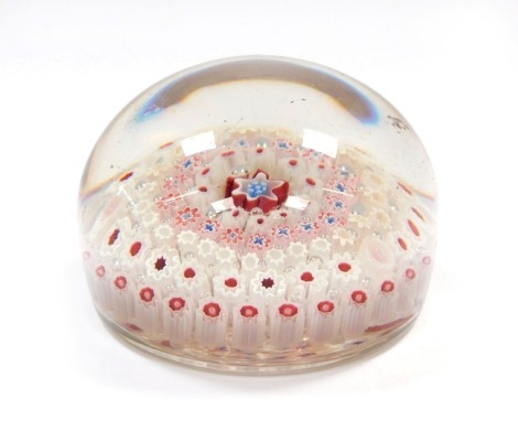 A late 19thC concentric millefiori paperweight, of high domed form, 8cm diameter.