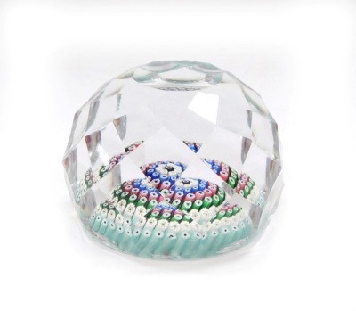 A Whitefriars faceted glass and concentric millefiori paperweight, with dated cane for 1973, 7cm diameter.