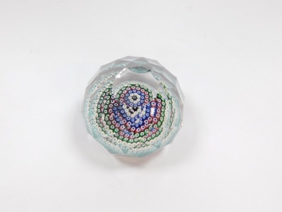 A Whitefriars faceted glass and concentric millefiori paperweight, with dated cane for 1973, 7cm diameter. - 2