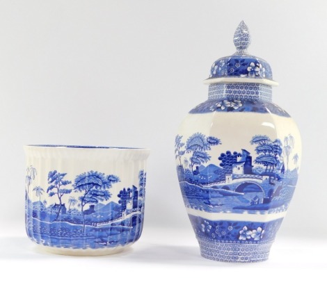 Two Spode Blue Tower ware ceramics, comprising a hexagonal jar and cover, 36cm high, and a planter, 17cm high. (2)