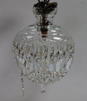 An early 20thC cut glass bag chandelier, with brilliant and prismatic cut drops, with brass hanging hook, 33cm high. - 2