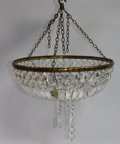 A mid 20thC cut glass chandelier, with brilliant and prismatic drops, on a brass frame and hanging, approx 53cm high.