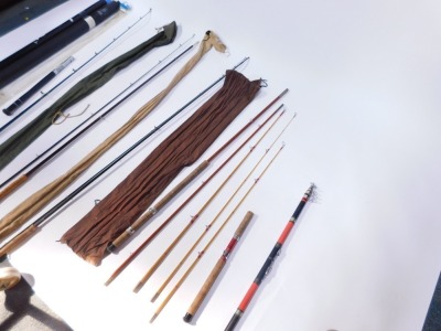 A group of fishing rods, comprising Shakespeare Sigmo boat 1470/020, split cane rod, red split cane rod, fibre glass rod, etc. (a quantity) - 4