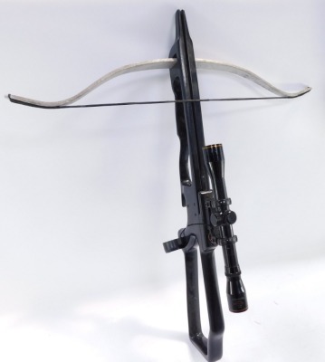 A Horton cross bow, with a Nikko Stirling telescopic sight, instruction book and arrows, 85cm long. - 5