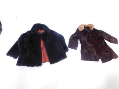 A lady's mink fur jacket, from Franklins For Furs of Leicester, with contrasting light coloured fur collar, and a further fur jacket, size 20.