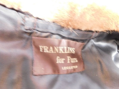 A lady's mink fur jacket, from Franklins For Furs of Leicester, with contrasting light coloured fur collar, and a further fur jacket, size 20. - 2