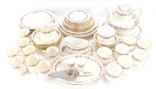 A Paragon China part tea and dinner service decorated in the Belinda pattern, comprising teapot, breakfast stand, serving bowl, serving plate, oval serving dish, six large dinner plates, six soup bowls, six dessert bowls, six side plates, six cake plates,