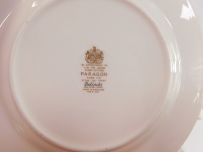 A Paragon China part tea and dinner service decorated in the Belinda pattern, comprising teapot, breakfast stand, serving bowl, serving plate, oval serving dish, six large dinner plates, six soup bowls, six dessert bowls, six side plates, six cake plates, - 2