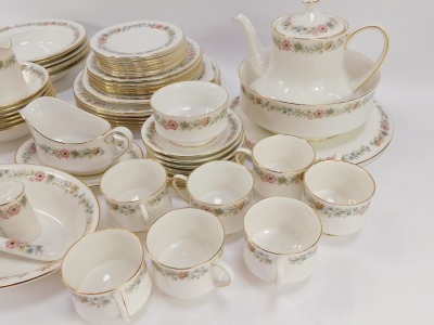 A Paragon China part tea and dinner service decorated in the Belinda pattern, comprising teapot, breakfast stand, serving bowl, serving plate, oval serving dish, six large dinner plates, six soup bowls, six dessert bowls, six side plates, six cake plates, - 3