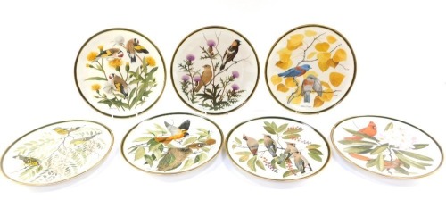 A set of Franklin Mint Songbirds Of The World collectors plates, comprising The European Gold Finch, Baltimore Oriole, Cardinal, Bohemian Waxwing, Magnolia Warbler, Western Blue Bird and Bobolink, 27cm wide. (7)