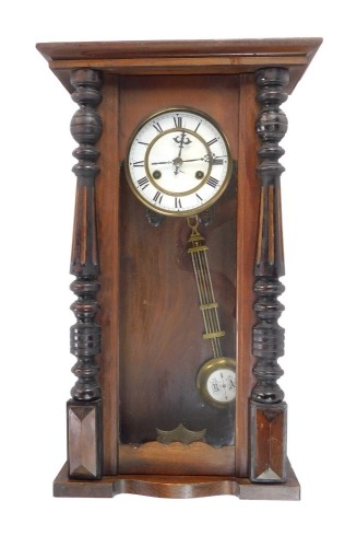 A 19thC Vienna walnut wall clock, the glazed door with white enamel dial and thirty hour movement, 56cm high, 31cm wide, 14cm deep.