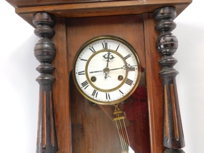 A 19thC Vienna walnut wall clock, the glazed door with white enamel dial and thirty hour movement, 56cm high, 31cm wide, 14cm deep. - 2