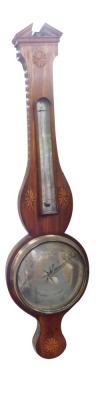 A George III mahogany wheel barometer, by F Molton of Norwich, with thermometer, the case with inlaid sunburst paterae, 38cm high.