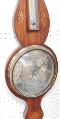 A George III mahogany wheel barometer, by F Molton of Norwich, with thermometer, the case with inlaid sunburst paterae, 38cm high. - 2