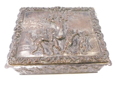 A late 19thC silver plated sewing box, the rectangular top with raised relief figures of cherubs, trees and flowers, opening to reveal a mustard lined interior, with bee stamp and double G to underside, 8cm high, 17cm wide, 12cm deep.