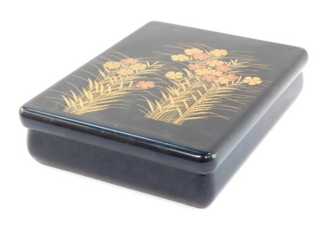 A Japanese lacquer box and cover, possibly by Zoliko, of rectangular section, decorated with flower the lid interior presentation dedicated to "Cllr DC Nemeth, Lord Mayor of Westminster....7th July 1992", 7cm high, 32cm wide, 23cm deep.