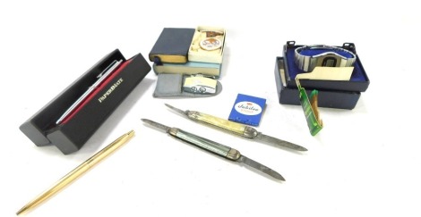 A group of pens, watches and penknives, Papermate Coca Cola pen, Parker gold plated biro, match cases, lighters, Masonic books, etc. (a quantity)