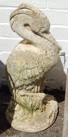 A reconstituted stone heron water feature, 67cm high.