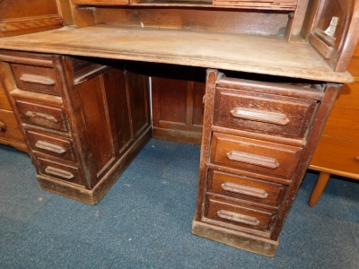 An Edwardian oak roll top writing desk, with S shape tambour, opening to reveal fitted sections above two pedestal each with three drawers, 124cm high, 125cm wide, 72cm deep. - 3