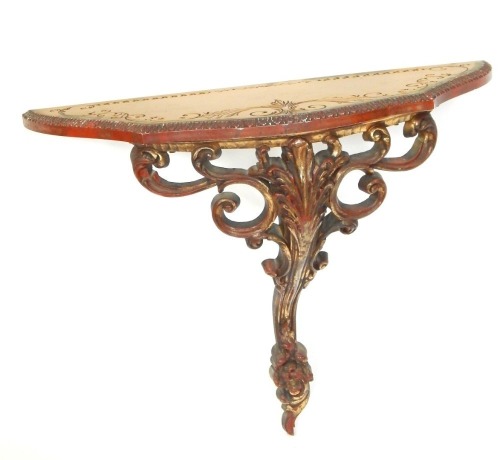 A 19thC gilt painted wall shelf, with scroll finial on tapered support, 50cm high, 64cm wide.