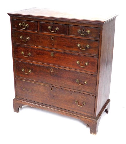 A 19thC oak chest, of three short and four long drawers, with brass handles and escutcheon, on bracket feet, 108cm high, 95cm wide, 49cm deep. (AF)