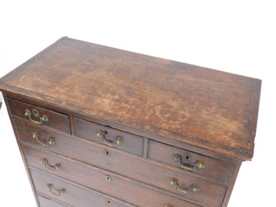 A 19thC oak chest, of three short and four long drawers, with brass handles and escutcheon, on bracket feet, 108cm high, 95cm wide, 49cm deep. (AF) - 2