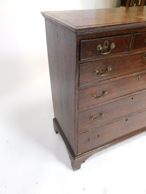 A 19thC oak chest, of three short and four long drawers, with brass handles and escutcheon, on bracket feet, 108cm high, 95cm wide, 49cm deep. (AF) - 3