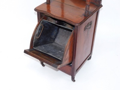 An early 20thC mahogany purdonium, with raised gallery shelf, and cupboard base with carved door, terminating in castors, 91cm high, 39cm wide, 36cm deep. - 3