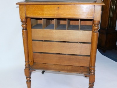 A Victorian oak clerk's desk, with galleried top with slope revealing desk top with the retailer's label for George Spademan, Cabinet Maker and Upholsterer, Stamford., over four fall flap drawer fronts, with Wellington locking action, opening to reveal pi - 6