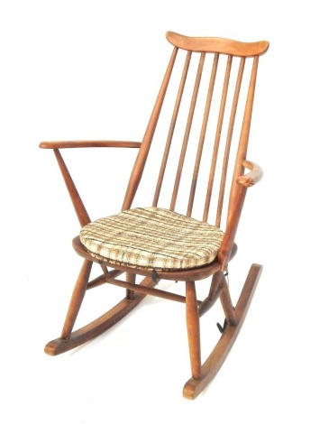 An Ercol beech rocking chair.