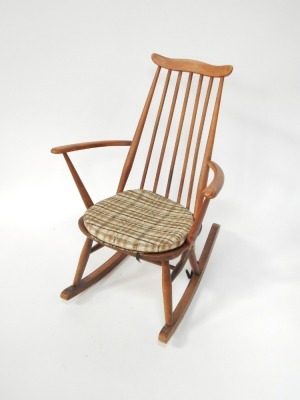 An Ercol beech rocking chair. - 2