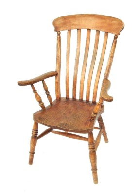 A 19thC ash and elm Grandfather chair, with lath back and turned legs.