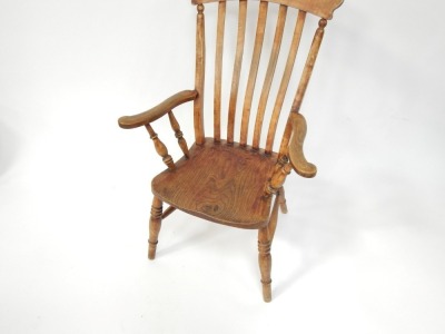 A 19thC ash and elm Grandfather chair, with lath back and turned legs. - 2