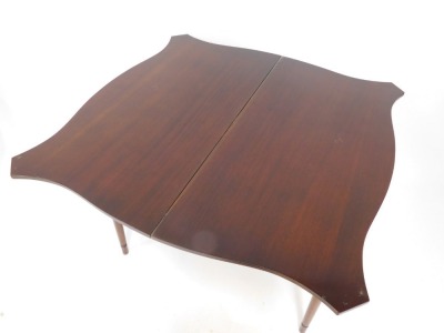 A mahogany card table, the shaped top with red leather inset top, above single drawer on tapered legs, 76cm high, 91cm wide, 43cm deep. - 3