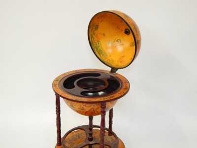 A late 20thC drinks globe trolley, on shaped mahogany base, with spin section, 93cm high. - 3