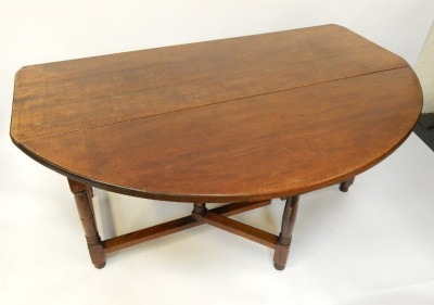 An 18thC style mahogany gate leg dining table, with three plank top on a turned base, 73cm high, 180cm wide, 150cm deep. - 2