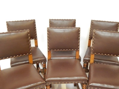 A set of six early 20thC Jacobean style oak dining chairs, each with a brown leather studded seat. - 3