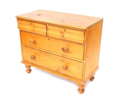 A Victorian stripped pine chest, of two moulded cushion drawers and two long drawers, on turned feet, 81cm, 93cm wide, 46cm deep.